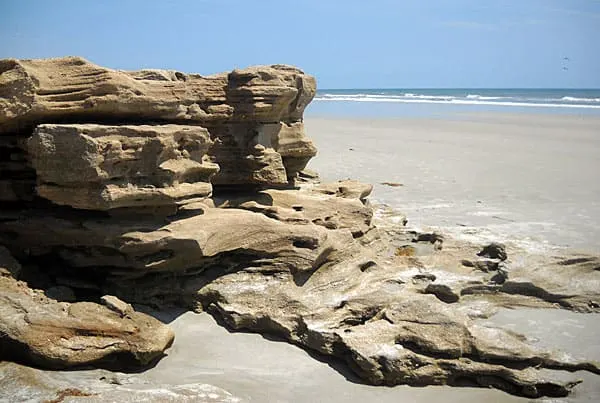 Along Florida A1A, you can stop at the beach at Washington Oaks Gardens State Park to see swirling coquina rocks along the beach. (Photo: Bonnie Gross)