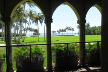 The stone house overlooks the boat turning basin, which is lined with majestic royal palms to create a memorably vista. (Photo David Blasco)