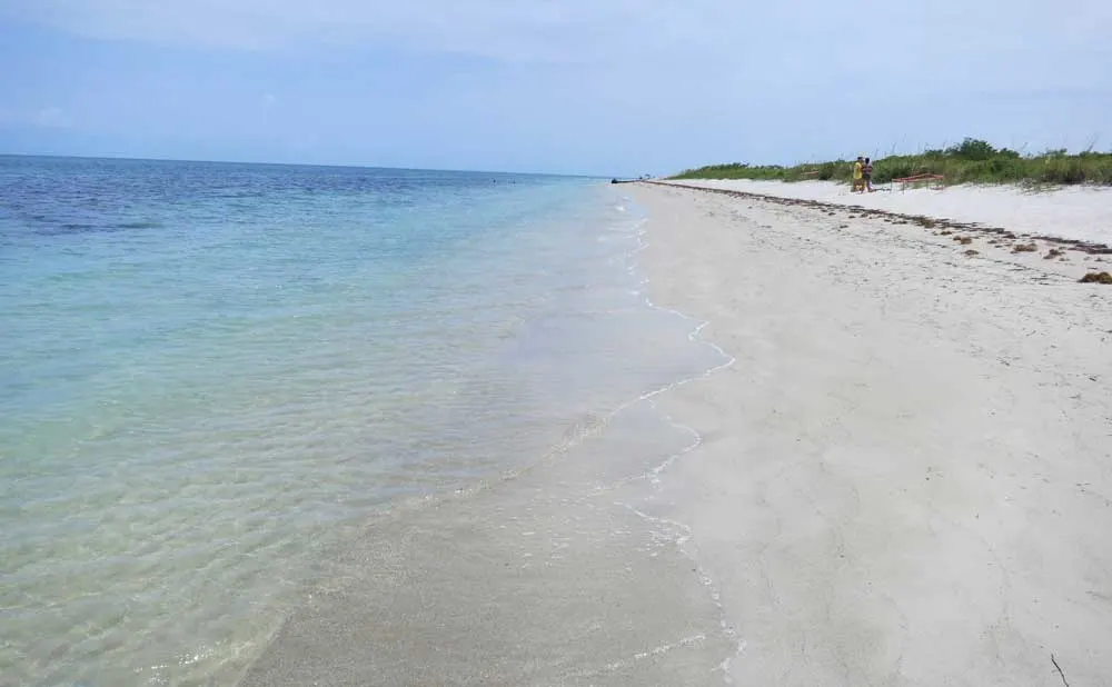 At the northern end, there are few people at the beautiful beach at Bill Baggs Cape Florida State Park on Key Biscayne.