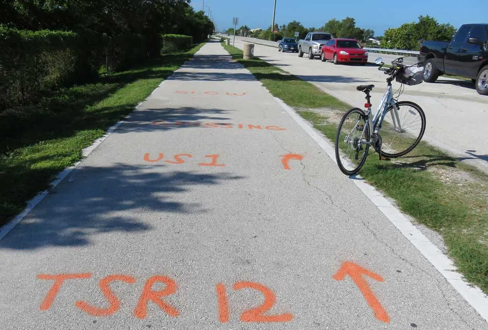 Crude signage tells you to cross U.S. 1 at the southern end of the Long Key Bridge on the Florida Keys Overseas Heritage Trail.