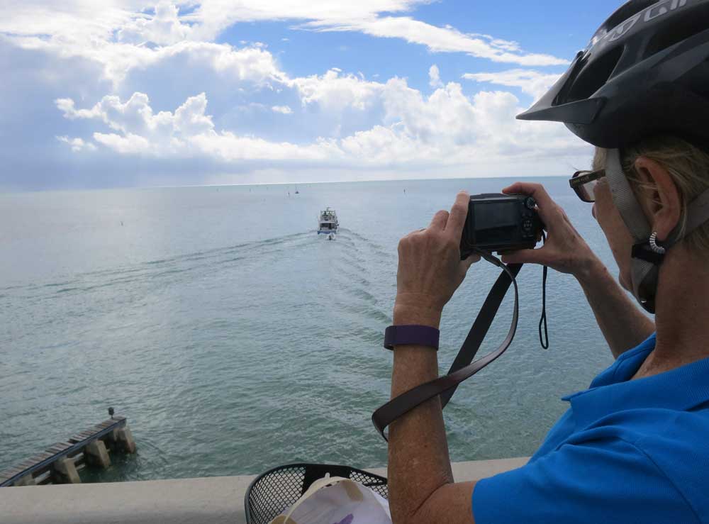 Pausing atop a bridge while biking the Florida Keys Overseas Heritage Trail in Islamorada.
