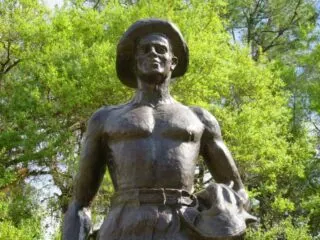 A statue in front of the Civilian Conservation Corps Museum at Highland Hammocks State Park.