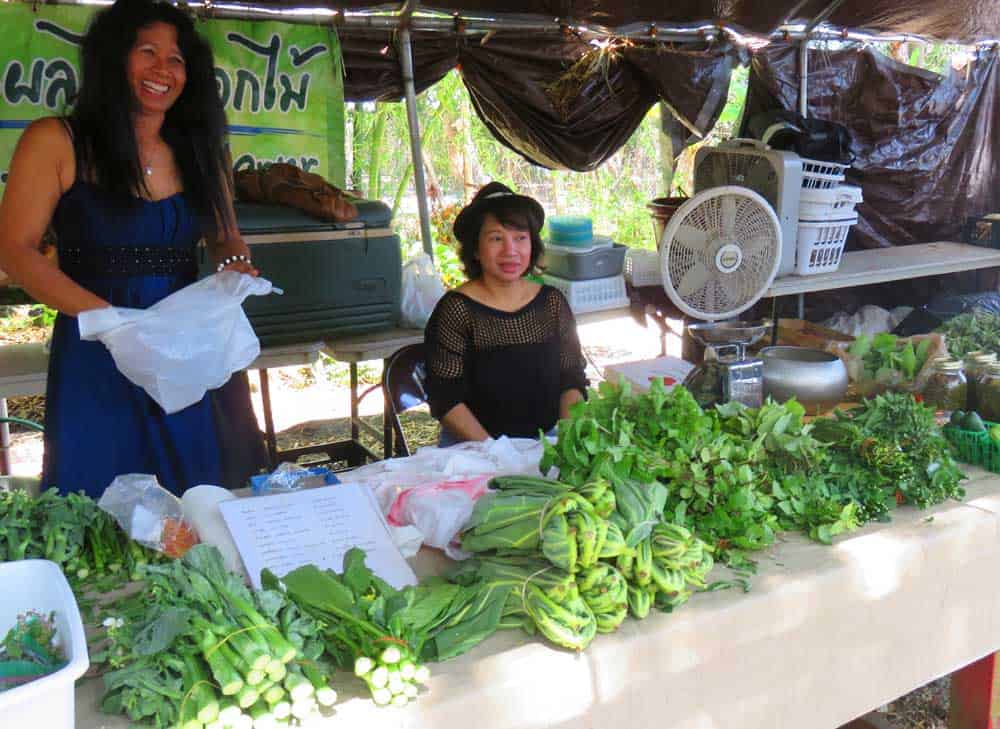 The Sunday market at the Tampa Buddhist temple includes booths selling vegetable and herbs.