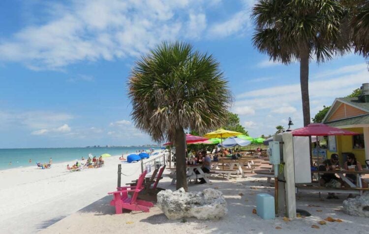 Pass-a-Grille, one of Florida’s best beaches in a charming historic town 5 The Paradise Grille is right on the sand of Pass A Grille beach.