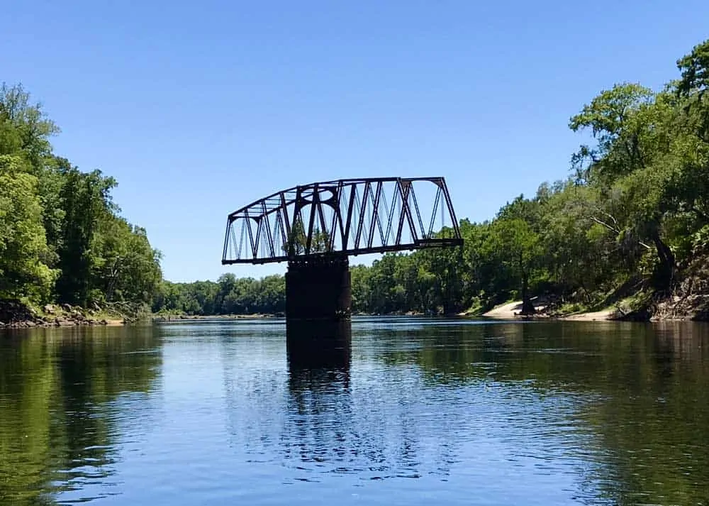 This rusty relic along the Suwanee River is a railroad swing bridge from the 19th century that was purchased from Brazil and used for a few decades in the early days of Florida railroads. (Photo: Bonnie Gross)