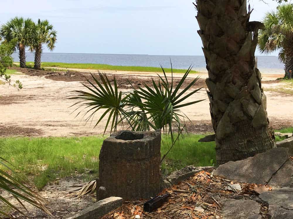 Wakulla Beach Road is a hard-packed sand road through a beautiful forest that ends at the Gulf where thousands of fiddler crabs cover the ground and the picturesque ruins of an old hotel are crumbling. It's a short drive off the Big Bend Scenic Byway.