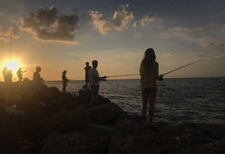 Fishermen at sunset on Casey Key.