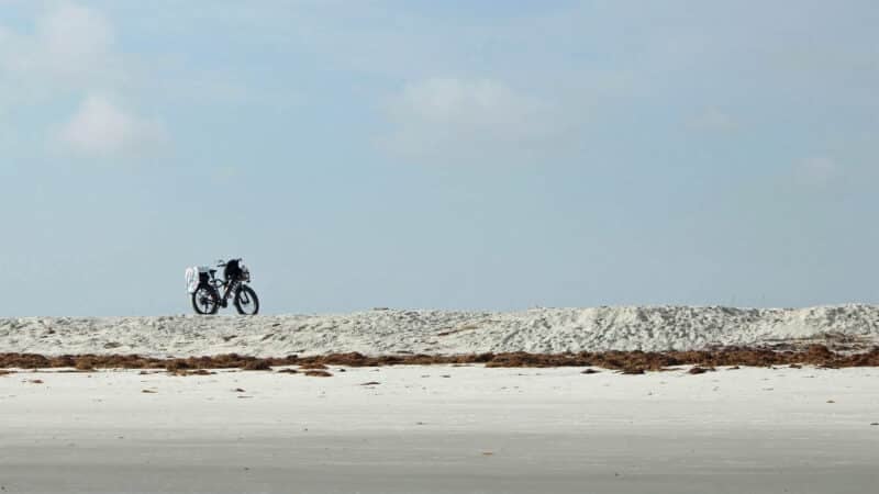 "Waiting For The Return" Anastasia State Park e-bike on the beach at Anastasia State Park Isaac Ewing