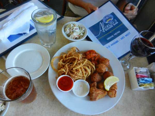 We shared Alonzo’s sampler: four conch fritters, four Buffalo shrimp, four fish fingers and a pile of onion rings. That would be $17.30, but happy hour prices made it $8.65. 