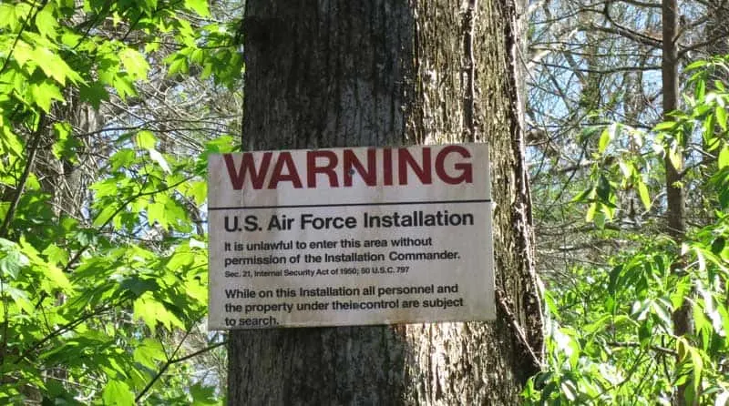 Warning signs for Avon Park bombing range lined one side of the Arbunkle Creek.