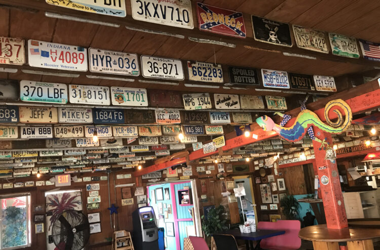 Every inch of wall is filled with license plates and miscellany at Archie's Seabreeze on A1A in Fort Pierce. (Photo: Bonnie Gross)