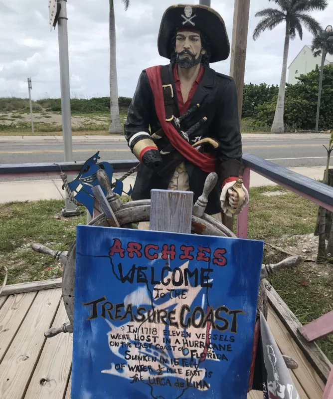 They've got a thing for pirates at Archie's Seabreeze on A1A in Fort Pierce. Behind the pirate, you see the dunes of the Atlantic beach. (Photo: Bonnie Gross)