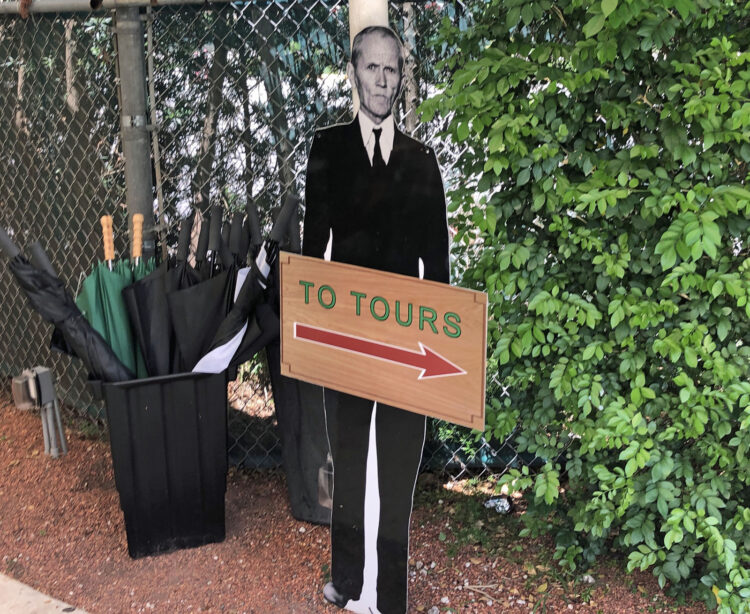 A life-size cut out of Ed shows his diminutive size. Especially if you compare him to the height of the nearby umbrellas. Photo Deborah Hartz-Seeley.
