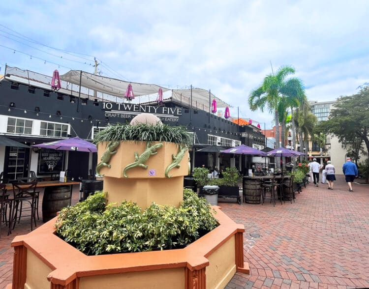 Fort Myers is worth a visit for fun downtown, natural beauty and history 6 The Patio De Leon is at the center of the River District. Built in 1913-15, one way visitors were attracted to this plaza was a fountain with alligators, which this planter commemorates. (Photo: Bonnie Gross)