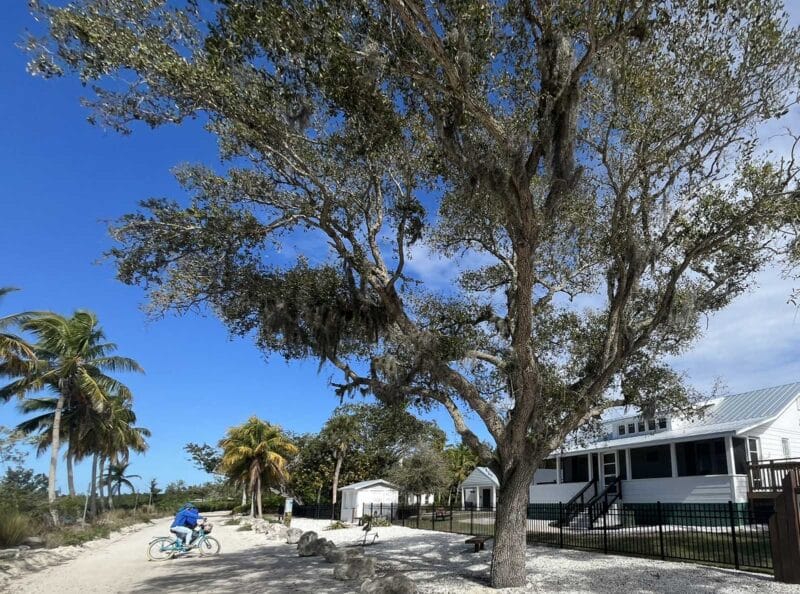 Historic Jungle Trail is an unpaved road to explore original Florida 6 Bicyclists pause to admire the bungalow that housed the pioneer Jones family who lived here for 121 years on the Jungle Trail. (Photo: Bonnie Gross)
