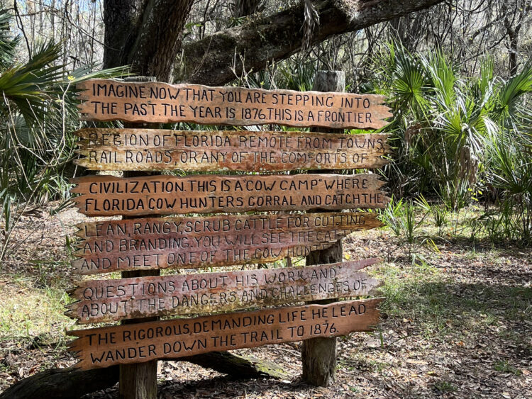 As you walk toward the Lake Kissimmee State Park Cow Camp, this sign helps you prepare. (Photo: Bonnie Gross)
