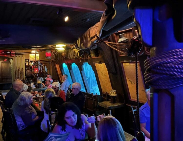 Our favorite way to visit the historic Mai-Kai restaurant: Come for happy hour; see the gardens 23 "Rain" pours down the window at the the Molokai Bar at the Mai-Kai Restaurant in Fort Lauderdale. (Photo: Bonnie Gross)