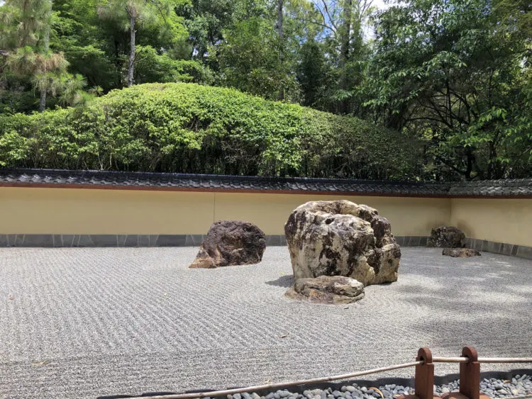 A flat expanse of precisely raked gavel studded with well-chosen and positioned rocks makes you stop and rethink gardens and gardening. Morikami Museum and Japanese Gardens photo by Deborah Hartz-Seeley