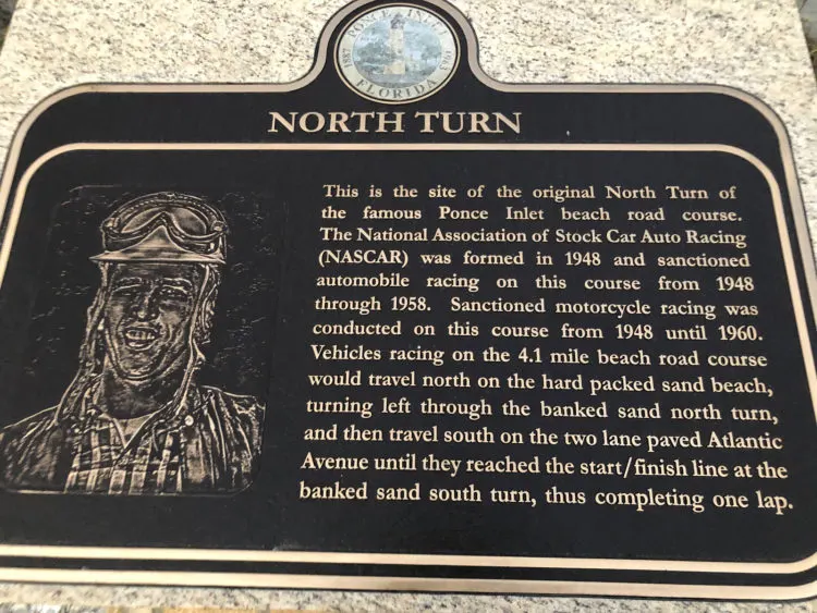 A marker in the Racing’s North Turn parking lot commemorates the importance of NASCAR to Ponce Inlet. (Photo by Deborah Hartz-Seeley)