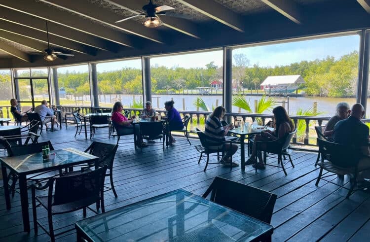 Take a perfect trip to Everglades City 9 The Everglades City Rod and Gun Club has a large screened porch off the dining room that has a wonderful view overlooking the Barron River. (Photo: Bonnie Gross)
